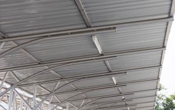 installing Long Green metal roofing